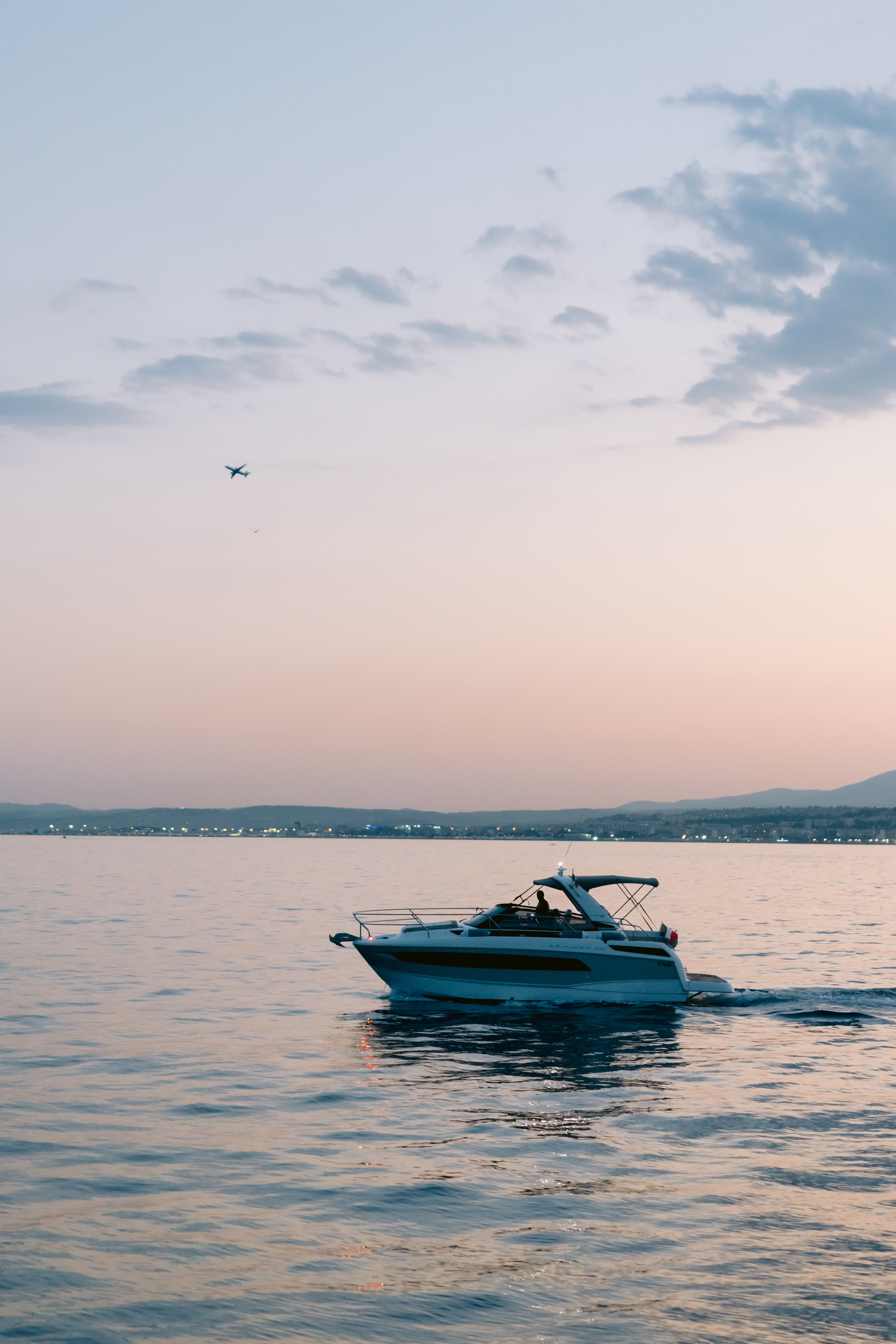 Cap Ferrat coastline at dusk from the water